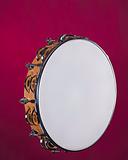 Tambourine Isolated on Red