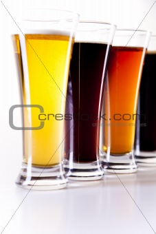 Glass of beer on a white background