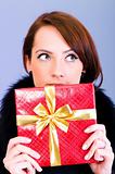 Young woman with red gift box