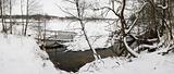 Winter landscape with stream and bridge, panorama from 5 images