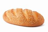 Long loaf of fresh bread with sesame seeds