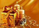 christmas gift in gold box with bow