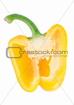 Cutting the yellow pepper isolated