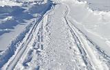 Narrow snowy winter road