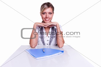 Businesswoman sitting with documents