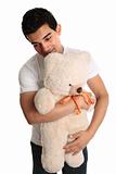 Man hugging a teddy