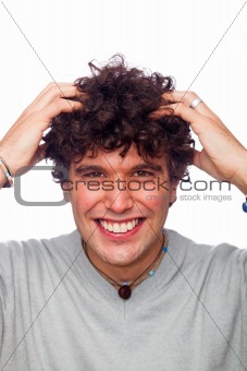 Young Man Smiling Face with Hands in Hair