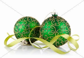 two green ball with ribbon