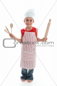 Little chef holding kitchen utensils