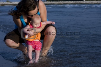 Mom and Baby Dipping Toes at Beach