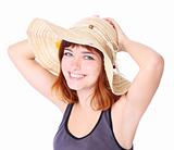 girl with hat is smiling