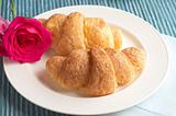 Croissant with roses