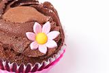 Chocolate cupcake with pink flower