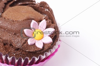 Chocolate cupcake with pink flower