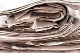 Stack newspapers 