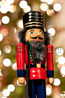Nutcracker in Front of a Christmas Tree