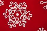 Red and White Snowflake Background