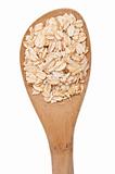 Fresh Whole Grain Oats in a Wooden Spoon