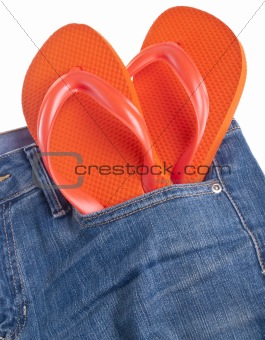 Summer Flip Flop Sandals in the Pocket of Denim Blue Jean Pants