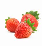 three strawberries on white background