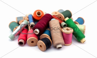 Thread spools isolated on the white