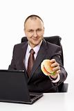 The businessman with a hamburger