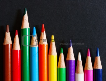 Color pencils on black paper