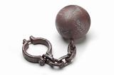 Metal ball and chain shackles on white