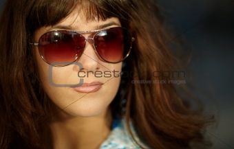 young woman  with sun glasses