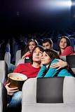 Enamoured couple at cinema