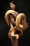 Beautiful woman holding Python