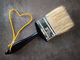Paint brush with a yellow rope
