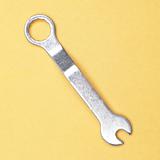 Small Wrench on Yellow.