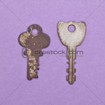 Set of Vintage Keys on a Purple Background.