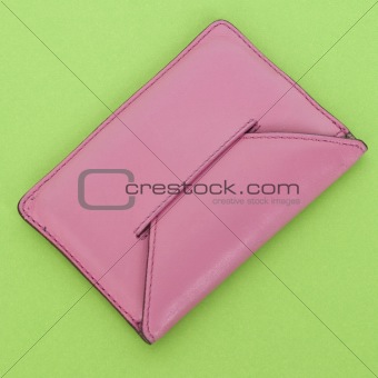 Pink Wallet on Vibrant Green