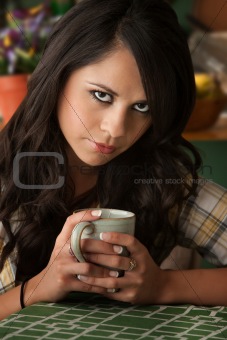 Beautiful Serious Latina Woman with Cofee or Tea