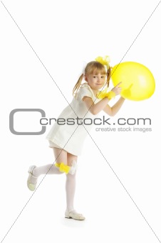 Girl with yellow balloon