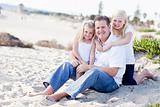 Handsome Dad and His Cute Daughters Portrait at The Beach