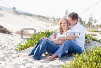 Attractive Caucasian Couple Relaxing and Enjoying the Beach Together.