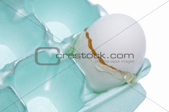 Broken Egg in the Carton