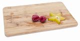 Fresh Raspberries and Carambola Starfruit on a Cutting Board