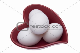 Fresh Eggs in a Heart Shaped Dish