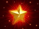 golden Christmas star over red background radiate
