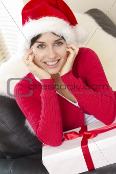 Picture of cheerful girl with gift box