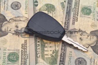Car Key on Money Background
