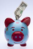 Brightly Colored Piggy Bank with Money