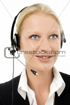 portrait of a young caucasian operator smiling with headphone and microphone