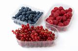 "three baskets of blueberries blackberries and raspberries"