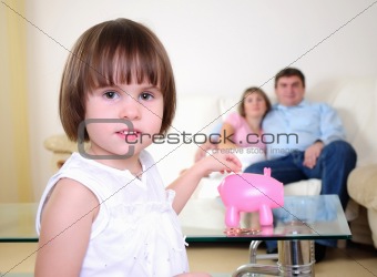 little girl hides her money