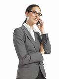 Young confident business woman speaking on phone
